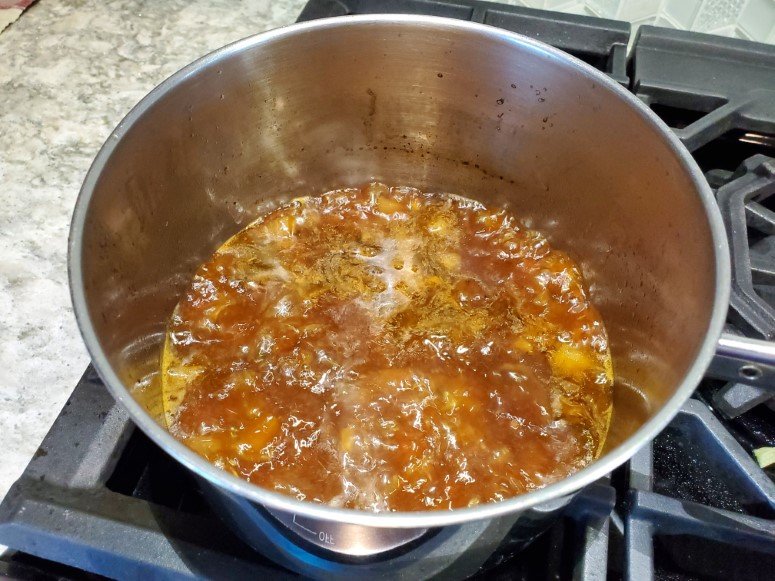 beef broth sauce on stove